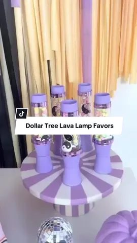 Dollar Tree Halloween hack you’ll want to copy before it’s gone 👻✨ These $1.25 finds just became spooky-groovy mini lava lamps—the perfect DIY party favor your guests will devour by the end of the party! ☮️ Spray, stack, add a disco touch, and finish with a ghostly yin-yang for the ultimate retro-Halloween vibe. 💀 SAVE this idea before Dollar Tree’s shelves are empty  