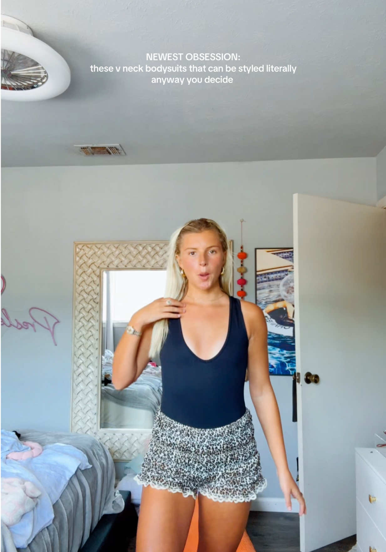 dress up or dress down 😍😍. I wore the white with leather shorts to dress up & the black with a white athletic skirt to dress down!! #bodysuit #vneck #tiktokshopaffiliate #teamwork 