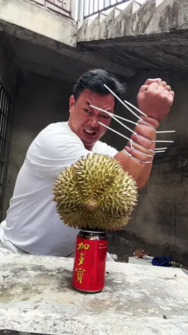 Iron man. Split the durian with his palm Please don’t try this at home  #ironman 