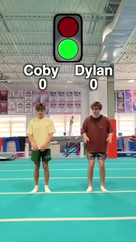 First to 10 Backflips Win! @Dylan Grogan #challenge #flips #redlightgreenlight 