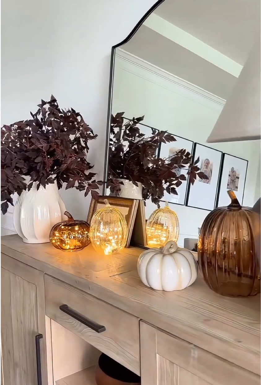 🔗 in comments and bio!  Love these neutral glass pumpkins, the cloche design allows you to add twinkle lights for a little extra glow ✨  p.s. please tell me I’m not the only one with a dining room table covered in clutter? Why does it always become the drop zone? 🫠  Follow @modernfarmhouse_ohio for more affordable home finds 🫶 #falldecor #autumnaesthetic #glasspumpkins #neutralpumpkins #targethome 