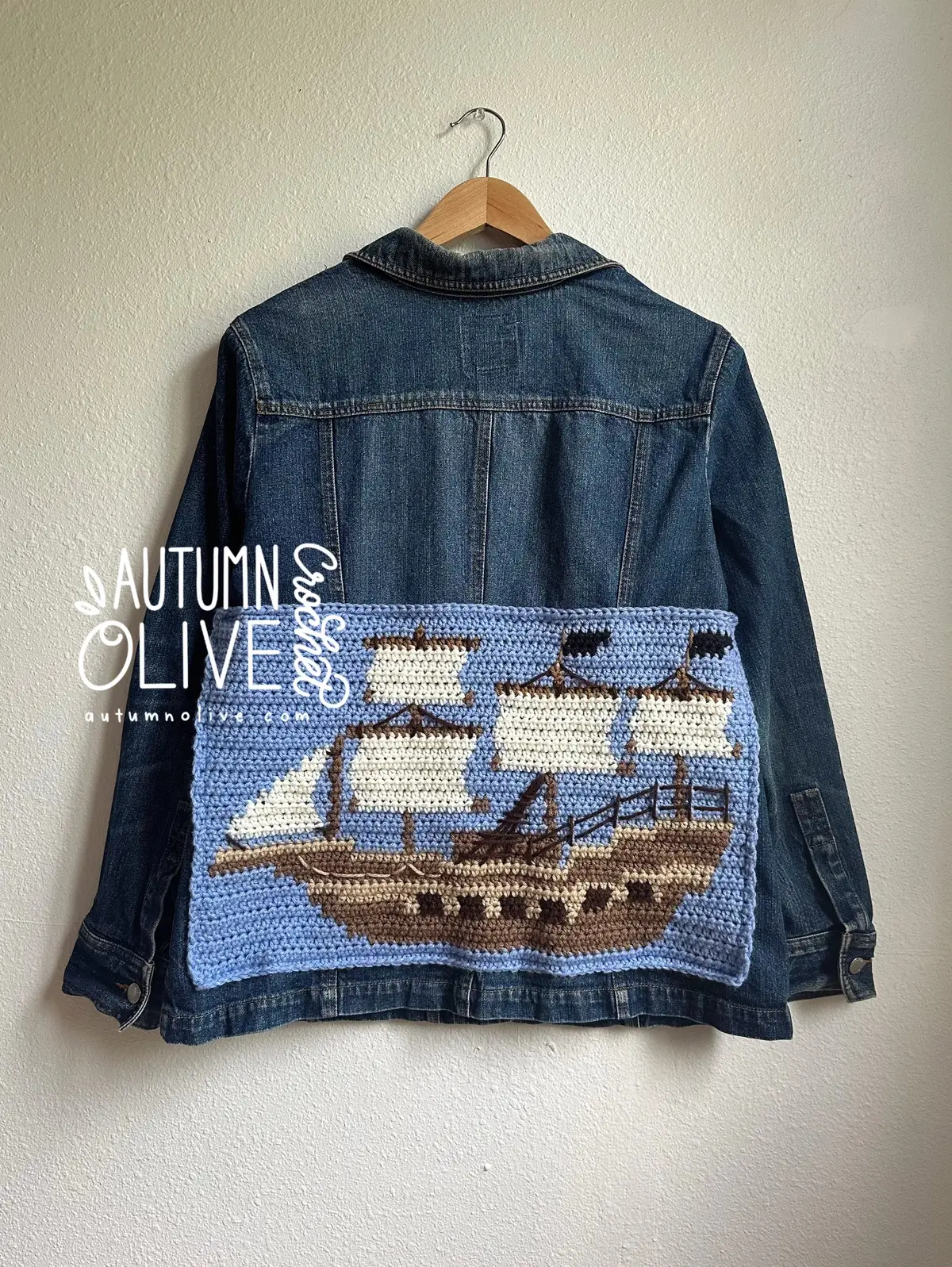 made with graphics from the float your boats pullover pattern ✨  • available on autumnolive.com jackets & vest are XL-XXL  • I have a video tutorial on how I sew a crochet tapestry to jackets & bags  • #boats #ships #crochet #tapestrycrochet #autumnolivecrochet   