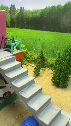🏡✨ Unique tiny house design with parking underneath and a cozy terrace on top! Would you live here? 🚗🌿.   #TinyHouse #Miniature #DreamHouse #minibricks #Handmade 