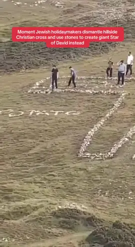 A group of Jewish tourists have been filmed dismantling a prominent cross on a Welsh mountainside and replacing it with a giant stone star. The 18-metre-long cross made of loose stones is thought to have stood for at least half a century on a hill below the summit of the Great Orme in Llandudno in North Wales, a popular tourist resort known throughout the region. So when footage emerged apparently showing a group of young people, some apparently in traditional garb, removing stones from the ancient Christian symbol, many were outraged. Adults who appeared to be among the group of young participants allegedly stood by and watched as the stones were moved. The incident has sparked outrage among locals, with many taking to social media to condemn the destruction of the cross on the hillside, popularly known as the 