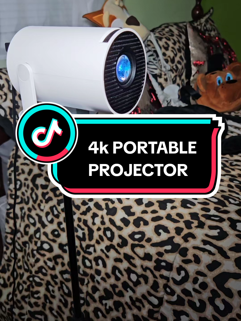 Magcubic Upgraded HY300Pro Projector 290ANSI 4K Videosource Supported BT5.4 Dual WIFI6 Android 11  Allwinner H713 Native 720P Wifi6 Home Theater Outdoor portable You can throw it up anywhere around your room, and it's super easy to use. It comes with a remote, so you can hook it up to your phone, computer, or any other device. The picture quality is amazing! It's perfect for your home or if you travel a lot. It's compact and has great battery life.  #projector  #4kprojector  #projectorscreen  #miniprojector  #portableprojector  