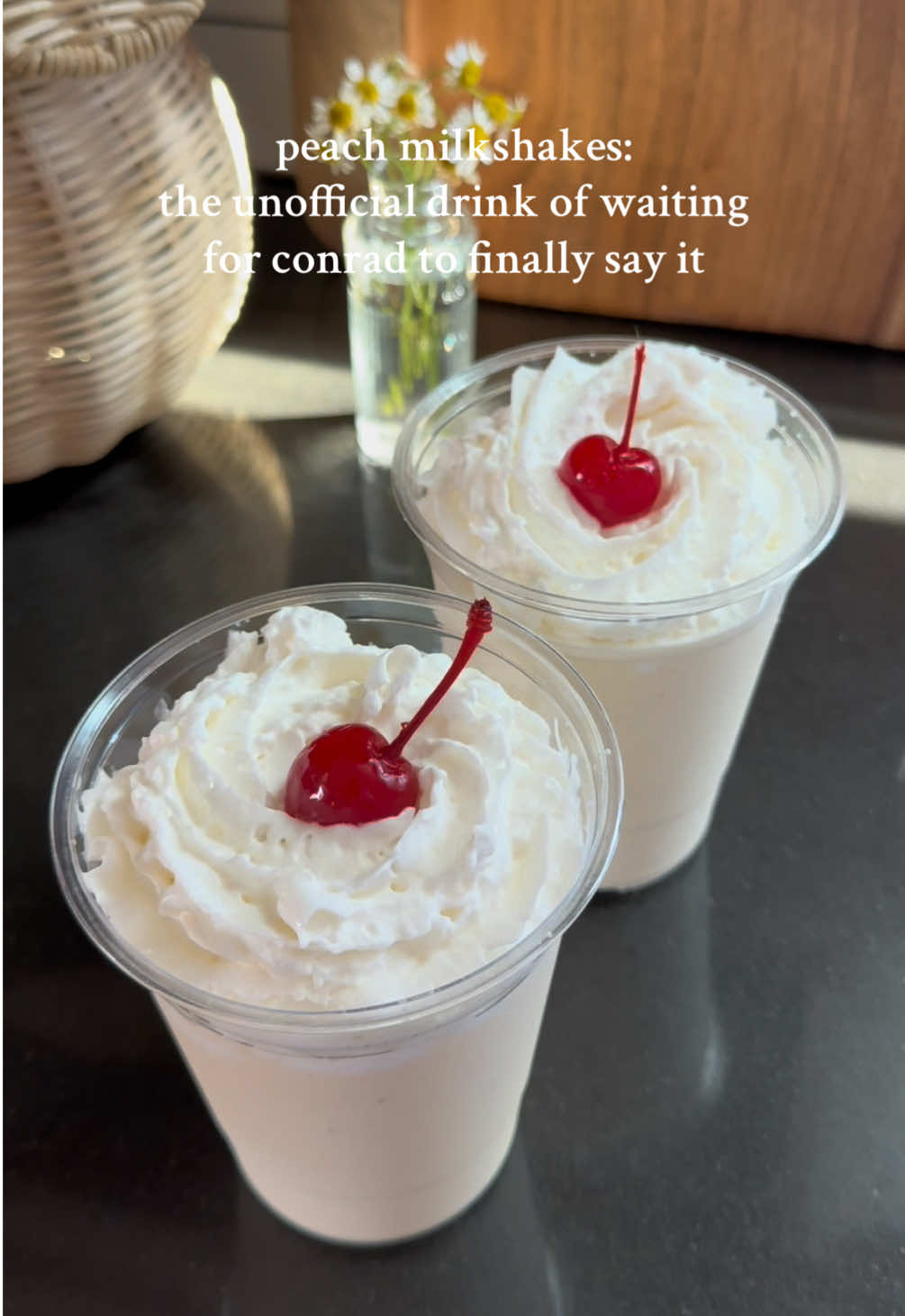 Peach milkshake 🍑 Ingredients for one milkshake: 2 cups vanilla bean ice cream 1/2 cup milk 1 cup frozen peaches Whipped cream Cherries In a blender, add the ice cream, milk, and peaches. Blend until smooth - be careful not to overblend. Top with whipped cream and garnish with a cherry! #thesummeriturnedpretty #teamconrad #conradfisher #fyp #peachmilkshake 
