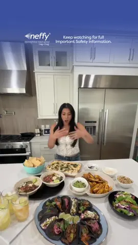 See full neffy® (epinephrine nasal spray) PI @neffy PI  A perfect avocado-free dip for the summer ft. neffy 🌮 💚 #helloneffy #neffypartner #sponsored #neffyEpinephrineNasalSpray @neffy is the only needle-free epinephrine nasal spray used for emergency treatment of allergic reactions including anaphylaxis, in adults and children aged 4 years and older who weigh 33 lbs or greater.  Talk to a doctor about neffy or go to neffy.com to learn more. Keep watching for full Important Safety Information. Avocado-Free 7 Layer Dip Ingredients: 1 can of refried beans 1 lb ground beef 1 taco seasoning packet 1 lb white American cheese 1 small can of chopped green chiles 3-4 tbsp heavy whipping cream 3-4 tbsp milk 16 oz sour cream 16 oz Pico de Gallo 2 cups shredded Mexican Cheese Chopped onions, jalapeños, cilantro for garnish Salt/pepper to taste Instructions: 1. Cook ground beef on medium high heat until fully cooked, then add in taco seasoning and mix until fully combined. 2. In a large, microwave safe bowl, add in American Cheese, green chiles, heavy whipping cream, milk, and a pinch of salt and pepper. Microwave this mixture in 1 minute intervals, stirring in between, until it is fully melted (about 3-5 mins.) 3. Spread can of refried beans along the bottom of a 9x13 casserole dish in an even layer. 4. Pour queso layer on top of the beans, followed by the ground beef. 5. Spread the sour cream layer next, followed by the Pico de Gallo and then the shredded cheese. 6. Top your dip with the final layer of garnishes - chopped onion, jalapeños, and cilantro. 7. Serve with chips and enjoy!