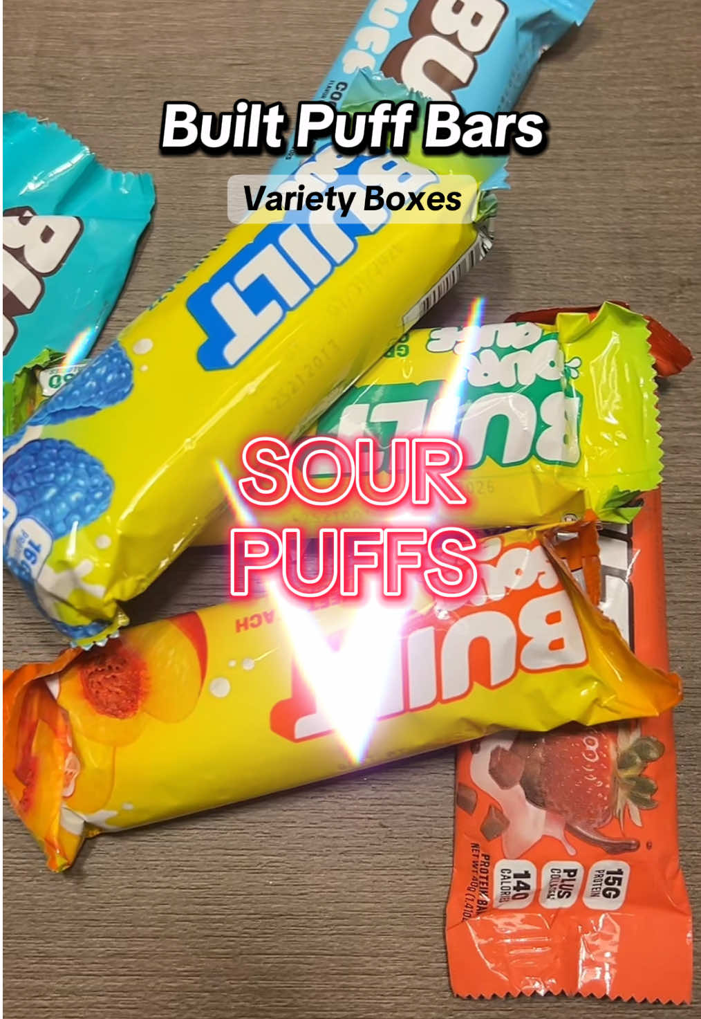 The NEW Sour Built Bar Puffs are also🔥  🍫 Classic Variety Box  	•Packed with protein + collagen 💪✨ 	•Delicious chocolate-covered flavor 🍫 	•Fluffy, marshmallow-like texture 😍 🍑 Sour Puffs Variety Box  	•Protein + collagen in every bite 💪✨ 	•Tangy, sweet, fruity flavors that taste amazing 🍏 	•	Soft, dessert -like texture 🤤 . . @BUILT.BAR #builtbar #protein #proteinbar #tiktokshopcreatorpicks #creatoricons 