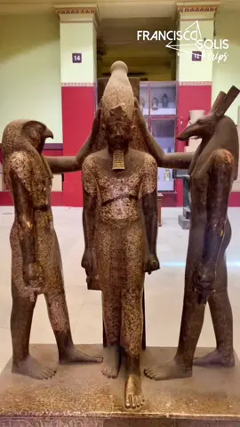 Ramses III between Horus and Seth, both holding the Ankh or 