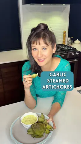 GARLIC STEAMED ARTICHOKES 🌿 Save this recipe! Though commonly thought of as a vegetable, artichokes are actually a flower bud 🌼. A relative of the famous milk thistle, artichokes stimulate bile flow, which helps to carry toxins out of our body. Artichokes have been used as an indigestion remedy in Europe for more than a century. One artichoke contains about 25 percent of our daily fiber needs and 16 essential nutrients, including vitamin C, potassium, folic acid, calcium and magnesium. FOR THE STEAMED ARTICHOKES: 4 fresh artichokes Pinch sea salt 2 Tbsp organic lemon juice 🍋 2–3 cloves garlic 🧄 1. Cut off some of the stem, and the tips of the artichoke leaves. 2. In a large pot, bring filtered water (enough to cover the artichokes) to a boil, and add the salt. Add the artichokes, lemon juice and garlic. 3. Simmer for 15 minutes, or until tender (older artichokes may take longer to cook). 4. To test for doneness, pull off a leaf; it should come off easily. Drain well, discarding the garlic, and dry the artichokes by squeezing gently in a clean kitchen towel. 5. Enjoy pulling off the leaves one at a time and dipping them in the sauce (recipe below). Remove the “chokes” (the hairy center) and discard. Marinate the hearts in the rest of sauce or add to your next salad. FOR THE HEART-HEALTHY DIPPING SAUCE: 1/3 cup extra virgin olive oil 🫒 1 clove garlic, minced 2 Tbsp raw apple cider vinegar 2 Tbsp organic apple cider (or unsweetened apple juice) 🍎 1 tsp raw liquid honey or coconut nectar 🍯 1 tsp Dijon mustard 1 tsp dried basil 1/2 tsp dried oregano 1/4 tsp pink rock or gray sea salt Add all the ingredients to a blender, and blend on high speed until emulsified. This sauce is so tasty that you can use it to flavor any steamed greens, not just artichokes.