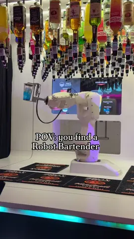 Stumbled upon a robot bartender in Vegas.🦾🍹 I was definitely intrigued, especially since there still an employee nearby switching the empty bottles out, checking IDs, and cleaning up. So it wasn’t just a robot running the show solo.  #robot #robotbartender #bartender #vegas #lasvegas    