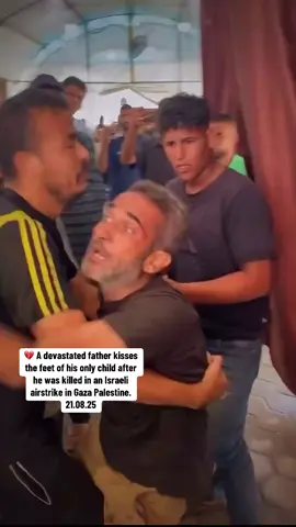 Heartbreaking | A devastated father kisses the feet of his only child after he was killed in an Israeli airstrike in Gaza Palestine. #foryoupage #fyp #fypppppppppppppp #foryou #foru 