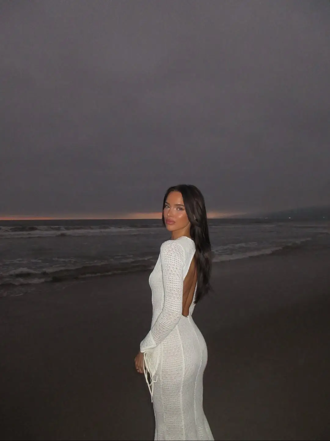 @Genelle stunning after sunset in our Pamina Dress 🤍🐚