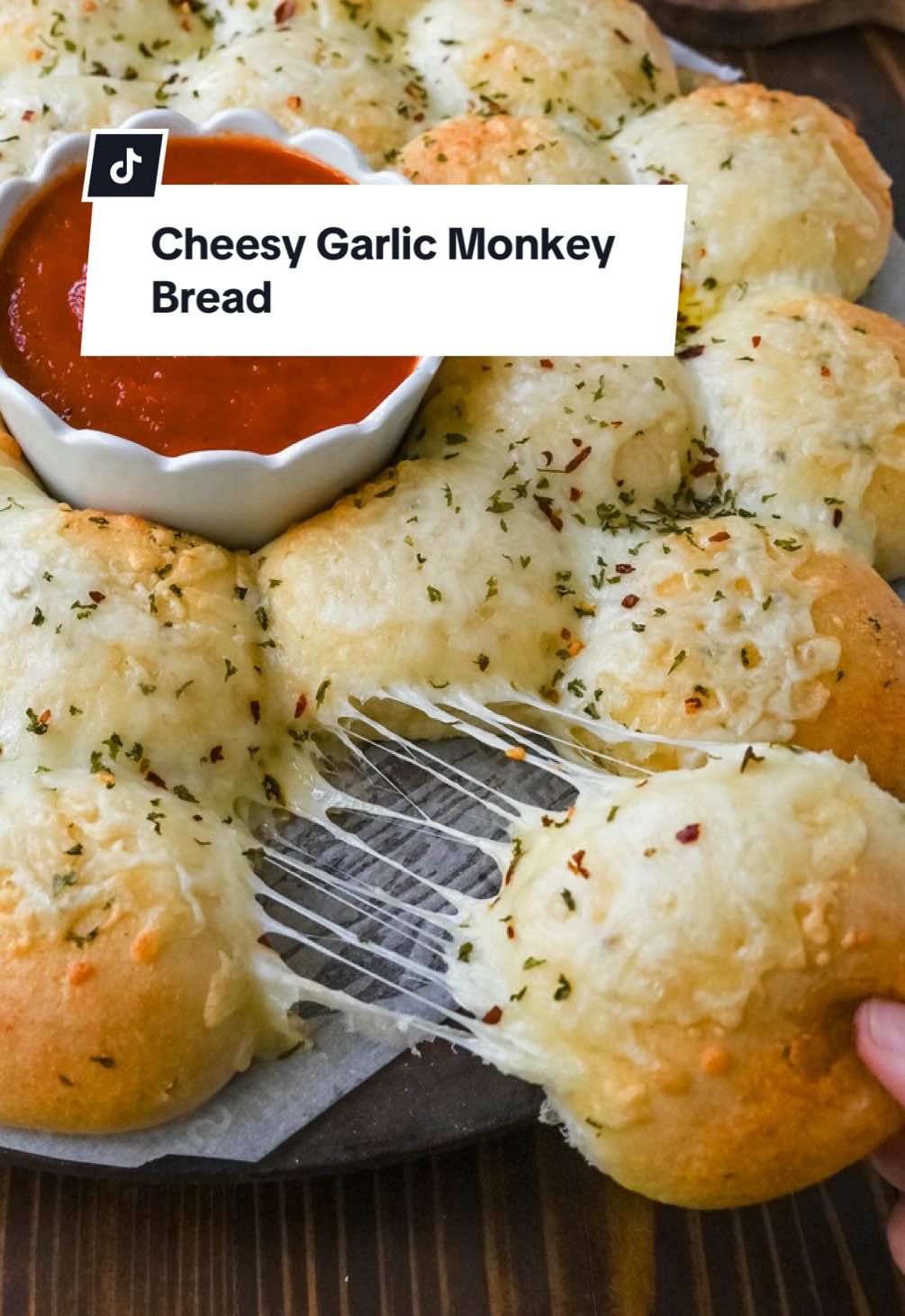 Cheesy Garlic Monkey Bread is the best easy appetizer! Find the full recipe in my bio. #monkeybread #cheesebread #easyappetizers #appetizer 