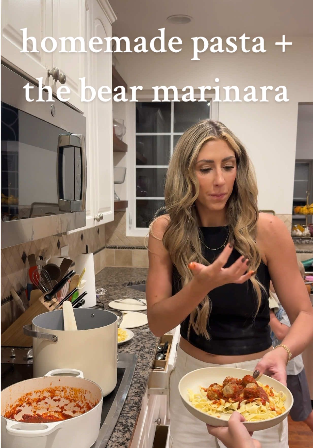 HOMEMADE PASTA & THE BEAR MARINARA SAUCE 🍝 if you’ve never seen the bear.. you haveeee to watch it it’s so good AND so is this meal it’s my fav to make recipe below  PASTA: INGREDEINTS: (single batch - I doubled) - 2 cups all purpose flour, 3 eggs, 1/2 tablespoon olive oil, 1/2 teaspoon salt INSTRUCTIONS: 1) place flour on clean surface and create nest. Add eggs, olive oil and salt to middle of nest. Mix with fork and incorporate flour inward as long as possible without breaking nest (I find it makes dough smoother). Knead dough with hands until smooth and bounces back when pressed, form into ball and wrap in plastic wrap. Let rest for at least 30 minutes. 2) slice dough into 4 pieces, run each through roller attachment 3 times at each level of kitchen aid (or roll out with rolling pin), then run through desired pasta cutting attachment (or cut with knife by hand). Be sure to separate layers of pasta with lots of flour to prevent sticking together! Boil pasta only 2-3 minutes, drain and add butter or olive oil. Serve with sauce THE BEAR MARINARA SAUCE: INGREDIENTS: 1/4 cup olive oil, 5 garlic cloves cut in half, pinch red pepper flakes, 1 white onion cut in half, 4 tbs butter, handful basil leaves, 2 small cans crushed san Marzano tomatoes (small cans are better per the bear!), salt pepper & sugar INSTRUCTIONS: 1) add olive oil, garlic cloves, basil leaves (with stems) and red pepper flakes to a large pot and cook over low heat. Remove basil when wilted, then garlic & olive oil when garlic is browned. Set aside until cooled, then process in food processor. 2) melt butter in pot. Add onion chopped in half and cook until lightly browned. Add tomatoes & salt, simmer 15 minutes. Add processed basil mixture and simmer another 10 minutes. Season to taste with salt, pepper &b sugar!