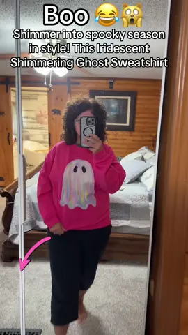 👻✨ Shimmer into spooky season in style! This Iridescent Shimmering Ghost Sweatshirt is the ultimate mix of cute + spooky vibes 💜 Perfect for Halloween parties, pumpkin patch pics, & cozy nights in 🎃 #HalloweenOutfit #SpookySeason #GhostSweatshirt #HalloweenAesthetic #FallOOTD  