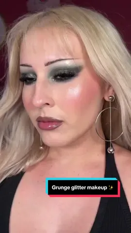 Glitter grunge 🖤✨ put on a smoldering, glittery eye look and I promise your day is going to get 10 times better 🫶 @Bobbi Brown Vitamin Enriched Face Base Moisturizer and Primer @about-face beauty The Performer Foundation in ‘L1Neutral’ ✨ Matte Fluid Eye Paints in ‘Hidden Garden’ and ‘Art of Darkness’ ✨ Fractal Eye Paints in ‘Refract’ and ‘Glitch’ ✨ Line Artist Gel Liner in ‘Into The Void’ @Lancôme Teint Idole Ultra Wear Concealer in ‘215 Buff Neutral’ @Fenty Beauty Cheeks Out Freestyle Cream Bronzer in ‘Butta Biscuit @Morphe Cosmetics Morphe 2 Hide and Peek Concealer in ‘Peek of Porcelain’ @ONE SIZE BEAUTY Ultimate Blurring Setting Powder in ‘Translucent’ @Kaleidos Makeup Mono Blush in ‘Dreamwalk’ ✨ Cloud Lip Clay in ‘Mercury Wave’ ✨ Untamed Glow Glossy Lip Glaze in ‘Last Smoke’ @Makeup Revolution Releoaded Highlighter in Dare to Divulge’ ✨ Wrap Lash Mascara @KISS Lashes Lash Couture The Muses Collection in ‘Noblesse’ @maccosmetics Lip Pencil in ‘Stone’ @L’Oréal Paris Infallible 3 Second Setting Spray • #makeup #makeuptutorial #grungemakeup #altmakeup #altgirl #glittermakeup #makeuptransformation #makeuptips #grungefashion #nightoutmakeup #datenightmakeup 