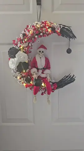 I'm sprinkling in some gothmas decor here! This cool Santa skeleton moon wreath is a perfect Creepmas gift for your spooky friends and family! 💀 #christmasgift #gothmas #creepmas #santaskeleton #spookychristmas 