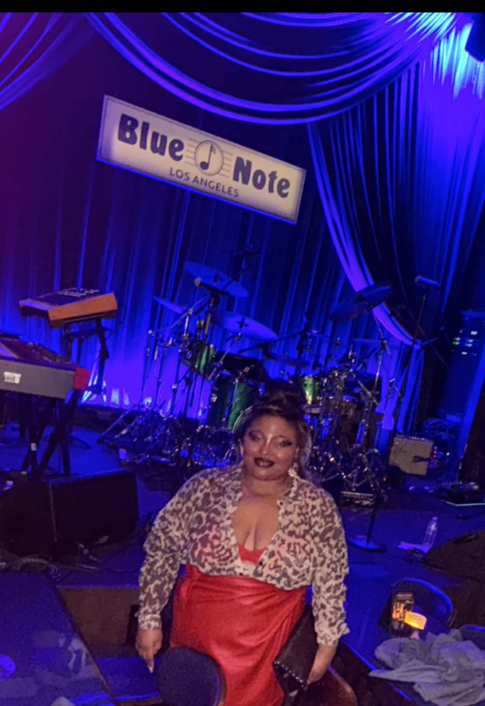 What a fun LA trip I had! Another birthday in the books and celebrated with a Jazz show. If you’ve never seen Terrace Martin, Kenyon Dixon, or Keyon Harold you gotta change that!! Literally moved my soul. Live music heals.  35 is the grown and sexy age and Jazz is so grown and sexy to me. I want to light some incense and some trees 🤭 when I hear it.  I love Black women cuz I kept hearing “c’mon red!” all night  My vision for the fit was fire duh. My high yellow ass, red skirt and bralette, and orange shoes 💅🏽  I know y’all love to tell me you hate an outfit when what do you want me to do about it? I’ve already worn it and taken it off for days by the time you see it?? Help me help you and miss me with bs Outfit details: Vegan Leather Mini Jaspre @Neverfullydressed  Bralette @Parade  Mesh Animal Print Blouse @asos  Orange Heels @RAID LONDON  @Monnie is so gorgeous! Follow her for dope art!! Black girl style, birthday outfit, style over 30, grown and sexy look