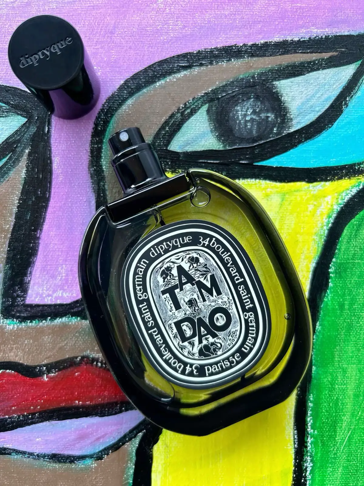 🌟Tam Dao Eau De Parfum Diptyque🌟 Tam Dao Eau de Parfum is not a fragrance that announces itself in haste. It does not shout, nor does it try to seduce through excess. Instead, it lingers in stillness, unfolding with the quiet patience of wood that has been polished by centuries of touch. To wear it is to step into a space of calm — the kind of calm that is not empty, but resonant, like silence inside a temple where incense clings to carved beams of sandalwood. When Diptyque released Tam Dao in Eau de Parfum form in 2013, a decade after the Eau de Toilette, they entrusted it once again to perfumer Daniel Molière, who had crafted the original. Rather than reinventing the composition, he chose to reinterpret it, shifting its balance from light to depth. The EDT was airy, transparent, carried by a fleeting brightness; the EDP, by contrast, is grounded, velvety, and more meditative. The first impression reflects this shift. Where the EDT greets with sparks of lime and ginger, the EDP makes no such gesture. It steps immediately into the shaded grove. Cypress appears first — tall, resinous, and dry, offering its dark-green spine to the composition. Cedar follows, sharp and clean, with that unmistakable pencil-shaving clarity. Together, they form a frame, a scaffolding of wood that sets the stage for the heart. And then the sandalwood rises. Not the faint, paper-dry sandalwood often found in modern perfumery, but the rounder, creamier impression inspired by true Mysore. It is resinous, slightly milky, and soft to the touch, like smooth wood warmed by skin. In the EDP, this note is more substantial than in the EDT — less transparent, more rooted. It clings to the skin like a second layer, humming quietly for hours. Coriander lends just enough spice to suggest warmth, though it never tips the fragrance toward heat. It is more of a flicker than a flame, weaving in and out of the resinous folds of the woods. And then, as the scent settles deeper, vanilla makes its entrance. Not sugary, not cloying — but a gentle cushion, softening the dryness of cedar and tempering the green severity of cypress. The vanilla wraps itself around the sandalwood, rounding its edges and making the whole structure breathe more slowly. The experience of wearing Tam Dao Eau de Parfum is not one of projection or trail. It does not bloom outward into the room. Instead, it turns inward, forming a kind of aura — a private chamber around the wearer. The projection is soft to moderate at best, the sillage intimate, and yet the effect is powerful in another way: it is unforgettable precisely because it does not overwhelm. Those who catch it briefly often cannot place it, only remembering that they encountered something serene, something that smelled like presence itself. On skin, the EDP lasts a full working day — eight, sometimes ten hours — and the sandalwood remains long after the brighter accents have faded. Where the EDT feels like a passing breeze through trees, the EDP feels like the trees themselves, rooted, unmoving, timeless. Tam Dao Eau de Parfum is not a fragrance for performance, for nights out, or for grand entrances. It is a fragrance of reflection. It is worn best in quiet moments, when you want your scent to align with your breath rather than with the crowd. To wear it is to carry a piece of stillness with you — a reminder that elegance does not always have to be loud, that strength can be found in quiet endurance, and that sometimes the most memorable fragrance is the one that clings not to the air, but to memory. #Diptyque #TamDao #TamDaoEDP #TamDaoPerfume #SandalwoodFragrance #MysoreSandalwood #WoodyPerfume #WoodyScent #LuxuryPerfume #NichePerfume #DesignerPerfume #FragranceReview #PerfumeReview #FragranceBlog #PerfumeCommunity #FragranceCommunity #PerfumeAddict #FragranceAddict #PerfumeLovers #FragranceLovers #OlfactoryJourney #PerfumeCollection #FragranceOfTheDay #PerfumeOfTheDay #ScentOfTheDay #FragranceDiaries #PerfumeDiaries @Diptyque International 
