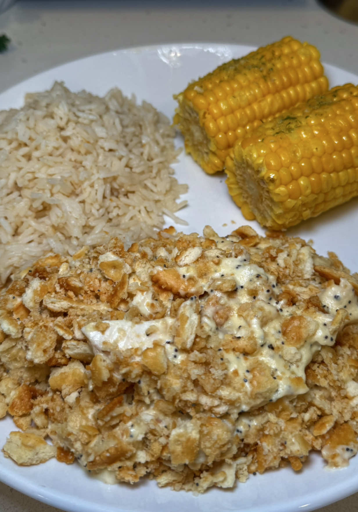 Poppy Seed Chicken Casserole 😌 Ingredients: 1 rotisserie chicken, shredded 2 cans cream of chicken soup 1 (16 oz) container sour cream 4 Tbsp poppy seeds Seasonings of choice (salt, pepper, garlic powder, onion powder, etc.) 2 sleeves Ritz crackers, crushed ½ stick butter, melted parmesan cheese (optional) Instructions: Preheat oven to 350°F (175°C). In a large bowl, combine shredded chicken, cream of chicken soup, sour cream, poppy seeds, and seasonings. Mix until well combined. Spread mixture evenly into a greased 9x13 casserole dish. In a separate bowl, mix the crushed Ritz crackers with melted butter. Sprinkle cracker mixture evenly over the top of the casserole. Add parmesan cheese if desired.  Bake uncovered for 30 minutes, or until hot and bubbly with a golden topping. Let cool for a few minutes before serving. 😋 #fyp #foryoupage #viraltiktok #viral #explore 