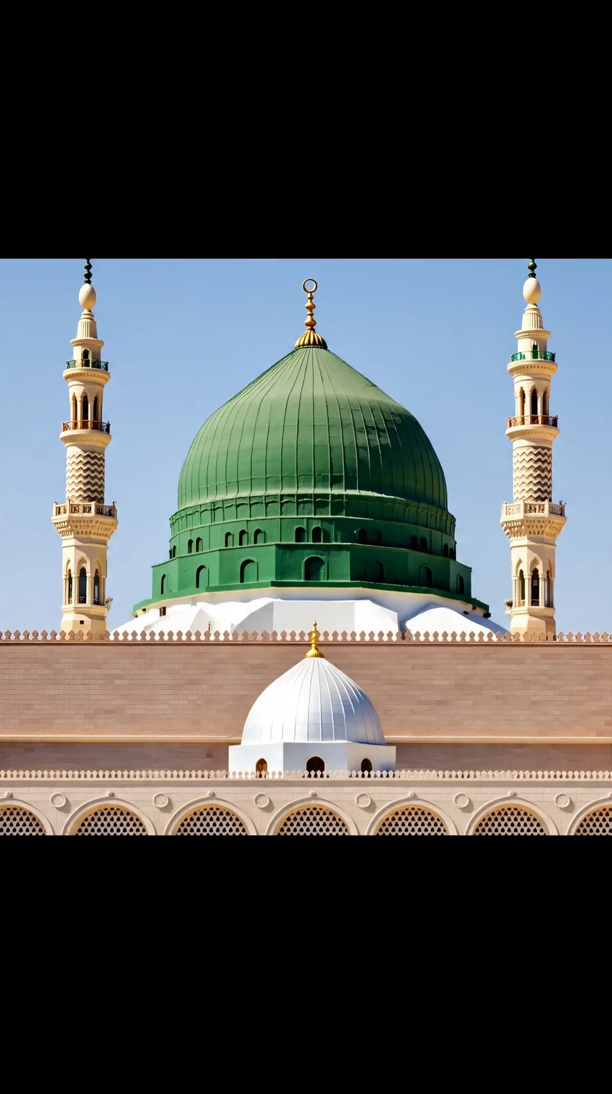 This image capture so the majestic beauty of masjid al-Nabwi, the prophet's mosque located in the hole city of Madina.the iconic green dome mark the resting place of the prophet Muhammad (PHUH). Sorrounded by elegant minaets, the mosque's stunning architecture is mu illuminatied under a blue sky. The expensive marbel courtyard reflects the sift sunlight, creating a serene and spiritual atmosphere. Pilgrims are seen peacefully walking and praying, symbolizing the unity and devotion of Muslim from around the world. This sacred site is not only an architectural masterpiece but also a place of deep reverence and tranquility. #share #fyp #islamicpost #foryou 