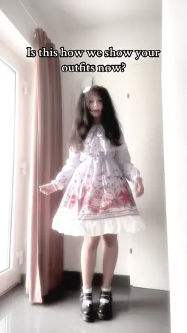 I AINT THINKING ABOUT YOUUUU :3 #fyp #katseye #megankatseye #lolita #lolitafashion #gameboy #gameboykatseye #japanesefashion #jfashion #sweetlolita  Dress- Second hand Hairclip with wings- Aliexpress Strawberry swirl hairclips- Gift from a con  Shoes- Doc Martens  Strawberry necklace- Yoyoso Pearl necklace- K-beauty Vienna 