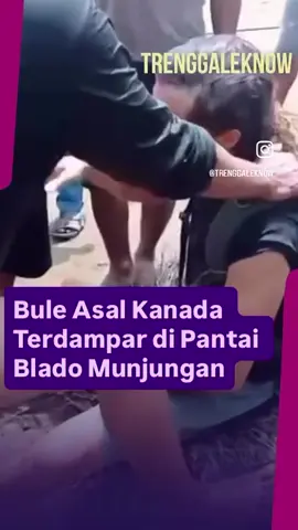 Sore ini, Jumat (22/8) sekitar pukul 15.04 WIB, warga sekitar Pantai Blado, Munjungan, Trenggalek, dikejutkan dengan munculnya seorang bule yang mengaku berasal dari Kanada. Warga melihatnya terombang-ambing di laut hingga akhirnya menepi ke bibir pantai. Dengan sigap, masyarakat sekitar langsung menolong dan membawanya ke daratan. Meski komunikasi hanya sebatas bahasa Inggris seadanya, warga tetap berusaha memastikan kondisinya. Kerumunan pun terjadi karena banyak yang penasaran. Hingga kini, kami belum mendapat informasi terkait kelanjutan nasib bule tersebut. [🎥: kiriman followers/@adittt004_] | Trenggaleknow Daily #trenggalek24jam 