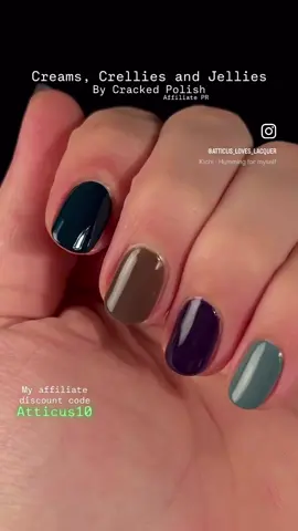 “Creams, Crellies and Jellies.”  A new polish collection of 8 just launched by @Cracked Polish (8am PST 8/22) [PR] You can get a discount if you use my code ATTICUS10 at checkout 🫶 thank you so much to everyone who uses this 🥹🫶 I chose to show off this new collection in two lovely skittles. I divided the collection by cold and warm tones 😁 Shade descriptions: “Eggplant Emoji”     A rich deep purple crelly.  (Shown in 2 coats on my thumb and ring fingers)  “Teal Dark and Handsome”     A rich deep teal cream. (Shown in 2 coats on my pointer finger) “Liquid Smoke”     A smokey brown jelly. (Shown in 2 coats on my middle finger) “Stated To Paint”     A slate gray cream. (Shown in 2 coats on my pinky) “Toasty Drip”     A sienna jelly. (Shown in 3 coats on my thumb and ring fingers)  “Laying Bricks”     A brick red cream. (Shown in 2 coats on my pointer finger) “I’m Shy”     A pale baby pink crelly.  (Shown in 3 coats on my middle finger)  “MUSTAAARD!”     A mustard crelly. (Shown in 2 coats on my pinky)  [this collection was gifted to me by the brand, no obligations to post] #crackedpolish #creamnails #crellynails #jellynails #cutenails      