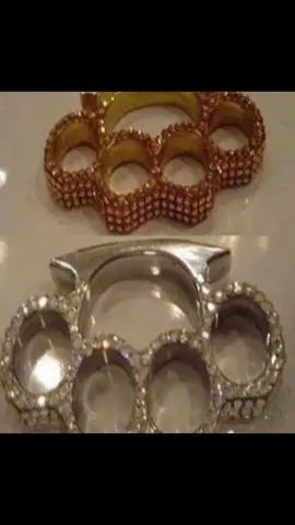 #knuckleduster Lowkey is the coolest weap0n in history #onionsong #trend #xyzbca #targetaudience  Knuckledusters, typically made from metals like brass, steel, or iron (though sometimes plastic or composites), are handheld melee we@p0ns worn over the fingers to enhance the impact of a pun[h by focusing force onto a smaller area while protecting the wearer’s knuckles . Their origins trace back to ancient we@p0ns such as the Roman cestus, Vajra-mushti in India, and the Sikh Sher Panja. The modern finger-hole design emerged around the 19th century, gaining popularity among soldiers and urban cr!min@ls for its concealability and effectiveness    . Knuckledusters are controversial—widely associated with vi0l€nce  and gang activity—and are illegal or heavily regulated in many countries, including under the UK’s Offensive We@p0ns Act 2019    . In pop culture and fashion, they’ve also become symbols of rebellion, toughness, and style, often appearing in punk aesthetics or collectible form  .