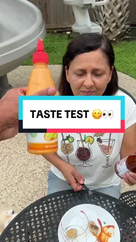 Let’s have my mom try the viral Lee Kum Kee sauces 👀😋🍗 #leekumkeesriracha #leekumkeebbq #tastysauce #foodtastetest #momandson 