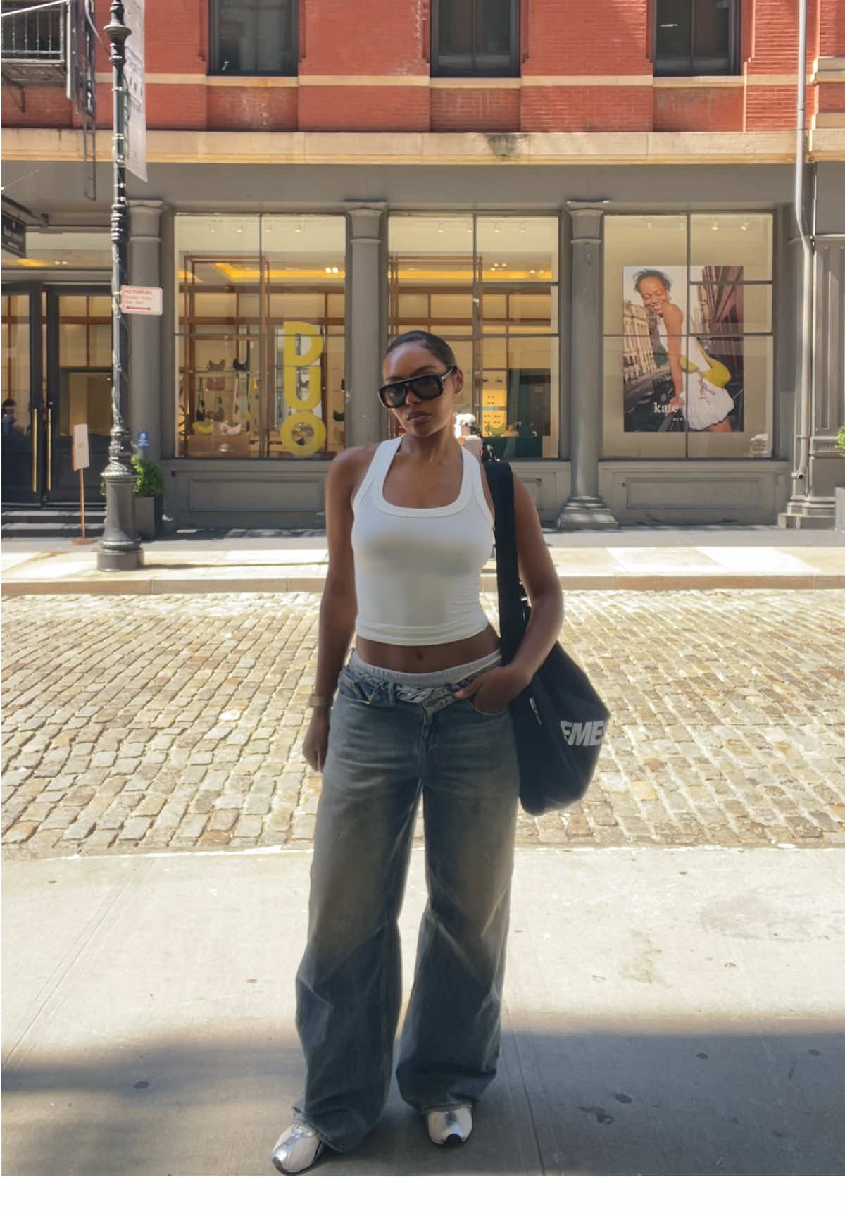 just landed in nyc 🗽  tank top @MY OUTFIT ONLINE jeans @KSUBI++ sunglasses @DEZI EYEWEAR bag @EME STUDIOS shoes @PUMA #fitcheck #inspo #soho #shopping #outfit 