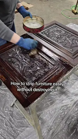 This works for paint and stain⤵️ 1. Brush on - We use a basic chip brush with our paint/stain stripper. Brush it on liberally and allow it to set for 15 - 20 minutes. Touch up any areas that dry out during that time. Some stubborn finishes may require repeat applications.  2. Scrap off - Use a solvent proof plastic scraper to remove the excess. We use a plastic drop sheet to collect the runoff residue on the floor that makes for easy cleanup.  3. Scrub with water - this is the key trick. Use a scrub brush with water to scrub down the residue. This works great for detailed areas that are difficult to sand. You can use After Wash instead of water if desired, but it isn't necessary.  🚨🚨We rinse most things down inside over the plastic drop cloth. For more detailed solid wood pieces, we spray those down outside. It's important to note that we only rinse down the minimal residue, and we are not on a city drain system. It is your responsibility to research proper disposal regulations in your areas as they vary greatly in different locations🚨🚨 *Also, my dogs are safe, I do not allow them to ingest anything in the shop. They are watched carefully.  4. Wipe down with wet cloth - We use a terry cloth rag to wipe down the surface. Rinse in the water and wipe again. Allow to dry at least 24 hours before proceeding. 5. Fine finish sanding - Each piece varies. We use 220 grit most often to do a light finish sand to even out the color. Use your discretion as to what grit is needed. #fyp #furniture #antique #restoration #DIY 