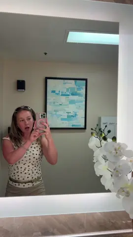 *In the mirror at work