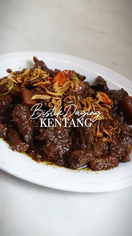 Bukan semur atau rendang. Ini Bistik Daging Kentang. Bumbunya legit merasuk ke dagingnya yang empuk. Dijamin ini akan jadi menu favorit keluarga. Bahan : 1-2 buah kentang sedang 7 siung bawang merah 5 siung bawang putih 3 butir kemiri sangrai 1 ruas jempol jahe 1 ruas jempol lengkuas 3 butir kapulaga ½ buah pala 3 butir cengkeh 1 sdm merica butir 1 batang sereh 2 lembar daun salam 500 gr daging sapi 1-2 buah tomat 1 pouch 62 gr Kecap ABC @ABC Ahlinya Buat Citarasa Hitam Manis 1 liter air 1 sdt garam 1 sdt kaldu bubuk 65 ml santan instan Cabe utuh secukupnya Bawang goreng #bistikdagingkentang #bistiksapi