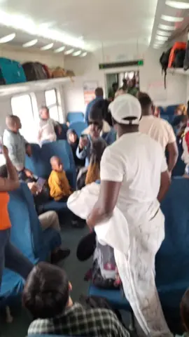 Drama at the SGR train as police offices wanted to arrest one citizen simply  because  he was taking alcohol  which he has bought from the station.But wakenya tunacheza kama sisi,wametuogopa😂😂😂#kenyantiktok🇰🇪 #sgr #nairobigossip #viralvideo 