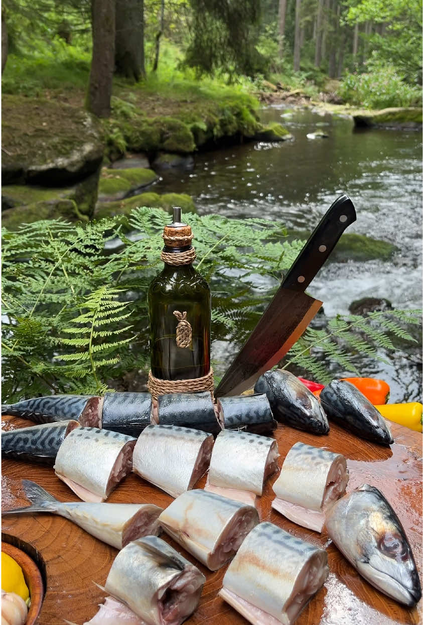 🇺🇸 | Would you feast on this juicy mackerel 🐟 , marinated in beer and grilled on a stone, with melt-in-your-mouth potatoes stewed in a cauldron? 👌😋 🇩🇪 | Würdest du dir diese saftige Makrele 🐟 gönnen, in Bier mariniert und auf dem Stein gegrillt, dazu im Kessel geschmorte, auf der Zunge zergehende Kartoffeln? 👌😋 🇷🇺 | Полакомился бы ты этой, маринованной в пиве и жареной на камне, сочной скумбрией 🐟 и тушенной в казане, таяющей во рту  картошкой? 👌😋 🔪🔪 The best universal knives from @The Nikos Knife (Ad) 🔥🫡 #fyp #food #cooking #foodporn #outdoorcooking 