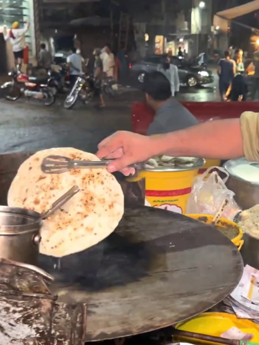 Welcome to the heart of Lahore’s old city – Heera Mandi! Tonight, I take you on a flavorful journey to experience the legendary Saag Paratha of Papu Parathy Wala, a hidden food gem that has been serving locals for years. From sizzling hot parathas to the rich, smoky aroma of freshly cooked saag, this late-night street food spot captures the true essence of Lahore’s vibrant food culture. Famous for its unique taste, unbeatable price, and traditional cooking style, Papu Parathy Wala is not just food – it’s history on a plate! #foryou #foryoupage #food #Foodie 