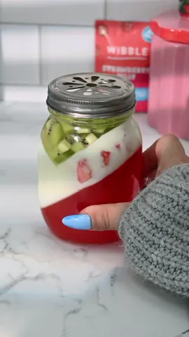 making aesthetic desserts for work bc I’m literally just a girl 🍓🥝 strawb, coconut & kiwi jelly jar made with wibble plant-based strawberry jelly, coconut milk and wibble vege-gel, strawbs & kiwi 🩵 #jelly #jellydessert #wibblejelly #fyp #desserttiktok 