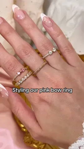 A bow you’ll never want to untie. ✨ Pink bow ring in gold available only in North America. #PandoraJewelry #RingStack