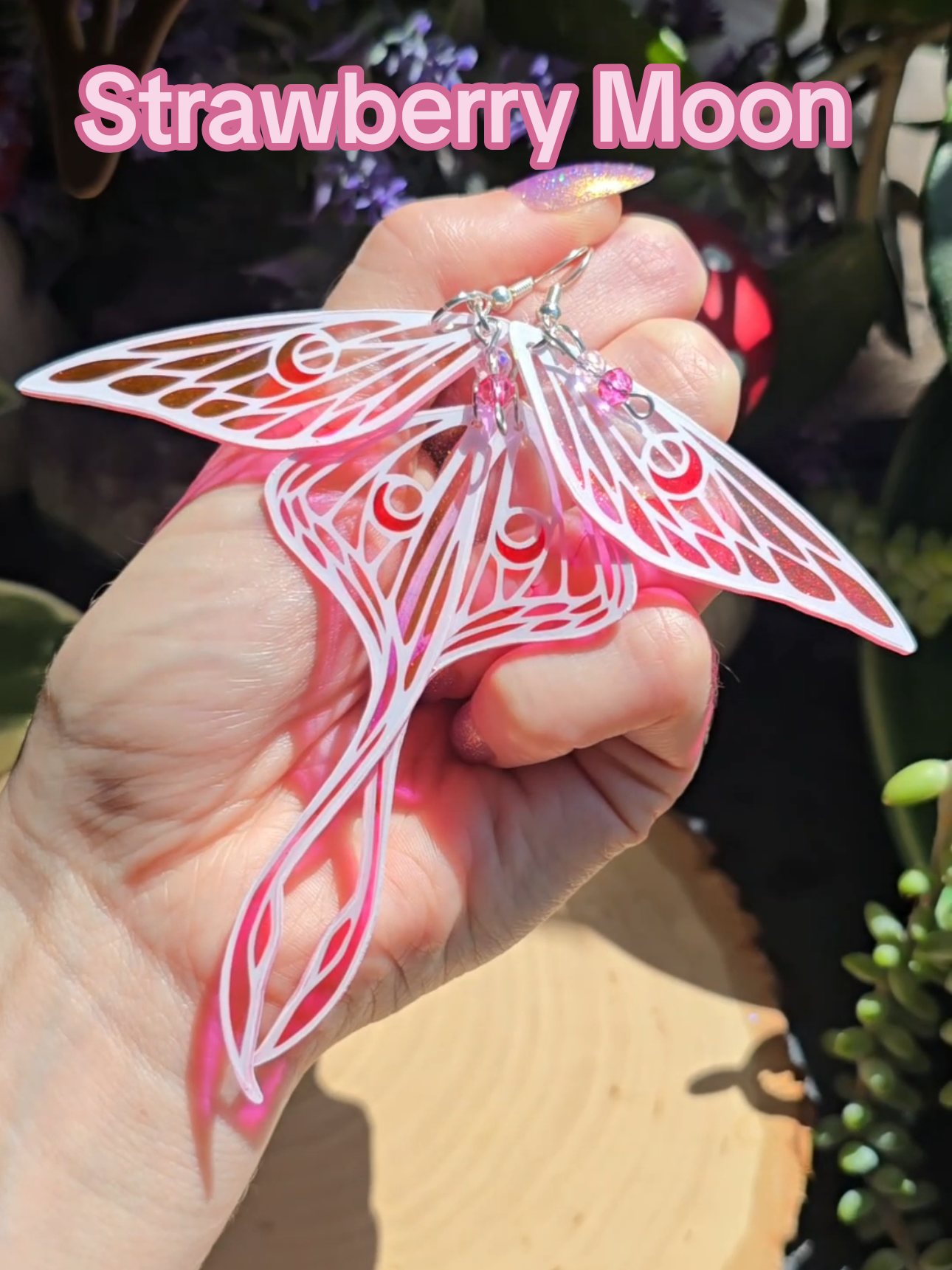 Strawberry Moon is such a cute name 🍓✨️  I'm so happy with how these turned out! I tried my best to model these Luna moth earrings off of the strawberry shortcake ice cream bars my parents would buy me when I was little! they are so dainty and absolutely gorgeous! #fairy #BookTok #cottagecore #fyp #wedding fashion, fantasy, strawberry, fairycore, holographic, suncatcher, jewlery, gifts, costume, renaissance festival