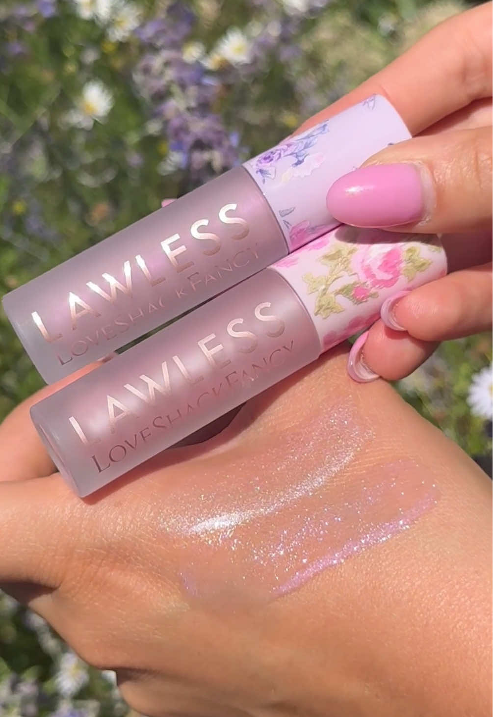 Swatching & Unboxing✨🌸💜Our LoveShackFancy x @LAWLESS Beauty Forget The Filler Plumping Lipglosses🌸In Shades Blooming Heirloom & Happy Thoughts💜Which is your fave?!🎀🌸Now available in stores & online at LoveShackFancy.com, Lawlessbeauty.com, Sephora.com & coming soon in stores at Sephora September 4th💕✨ #beauty  #sephora #lawless #loveshackfancy #lipgloss 
