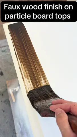 Faux wood finish on particle board tops for furniture are some of my favorite hacks to do #homeimprovement #DIY #fyp #paint #tools 