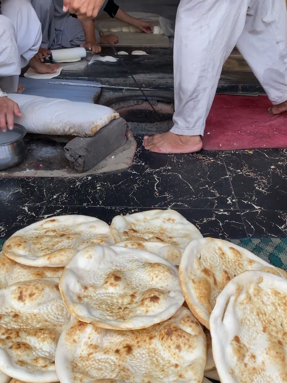 Traditional Way Of Baking Bread In A Clay Oven. #baking #bread #clayoven #fyp 