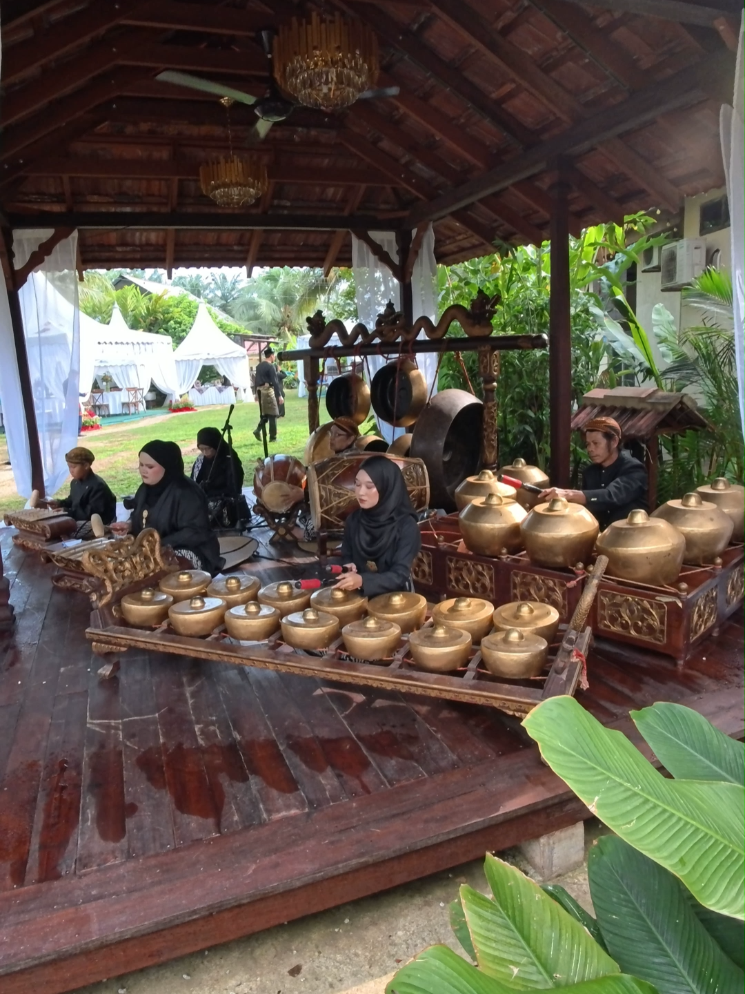 Gamelan is a traditional orchestra originated from Indonesia, with a rich cultural history, predominantly made up of percussion instruments like gongs, metallophones, and drums. The music features intricate cyclical structures and complex, layered melodies played by various instruments. #traditional #culture #music #musicalinstruments #instruments #melody #tradition #gongs #metallaphones #drums #history #cultural