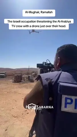 ‼️In Al-Mughair, Ramallah, Israeli forces threatened an Al-Arabiya TV crew by flying a drone just above their heads. Over 200 journalists have been killed in Gaza since October, many deliberately targeted the same way with drones and airstrikes. Yet reporters continue risking their lives to show the truth. #drone #Israeli #us#fypage #journalist #journalism 
