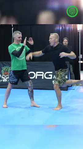 More footage here from the last time I helped the @UFC legend and world renowned MMA fighter that is @Georges St-Pierre during a seminar he led at a fantastic REORG sponsored For The Love Of MMA convention in Manchester a while back 🔥🥋 In this clip, which showcases more of his approach to striking in MMA, Georges talks about some of the ways he likes to use the superman punch whilst fighting or sparring!!  Soak in the brilliance on display and then make sure you smash the follow button on Mr St-Pierre, For The Love Of MMA and REORG across all social media today!! #MMA #GSP #UFC #MMAFighter #MMATraining           