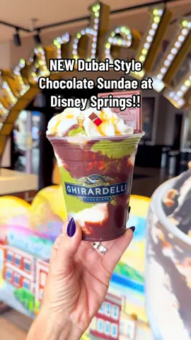 NEW Dubai-Style Chocolate Sundae at Disney Springs!!🍫✨ The viral Dubai chocolate is now a sundae at Ghirardelli! Vanilla ice cream • pistachio butter • toasted kataifi • white chocolate & sea salt • hot fudge • whipped cream • caramel • topped with a Ghirardelli Milk Chocolate Caramel Square 💚 📍 Ghirardelli Soda Fountain & Chocolate Shop (Disney Springs) 💵 $21.95 📅 Available through the end of 2025 ✨EnchantedFoodieGuides.com✨ #disneyworld #disneysprings #disneyfood #ghirardelli #icecream 