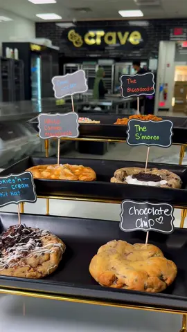 POV: You just walked into cookie heaven 😍 Which one are you grabbing first? 👇 ✨ Crave Cupcake ✨ The Biscadoodle ✨ White Caramel Macadamia ✨ The S’moreo ✨ Cookies ’n Cream Kit Kat ✨ Classic Chocolate Chip ❤️ ⚡ Warning: They taste even better than they look! #CraveCookies #TikTokEats #CookieTok #Foodie #fypシ゚viral 