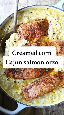 One-Pot Creamed Corn Orzo with Salmon.  recipe link in bio  🌽This one-pot wonder is beyond delicious, super easy to make and ready in 30 minutes. I’m sure it won’t take long for this comforting bowl to become a regular in your weeknight dinner rotation.  https://www.servingdumplings.com/recipe/creamed-corn-orzo-with-salmon/ #salmon #corn #summermeals #chef #Recipe